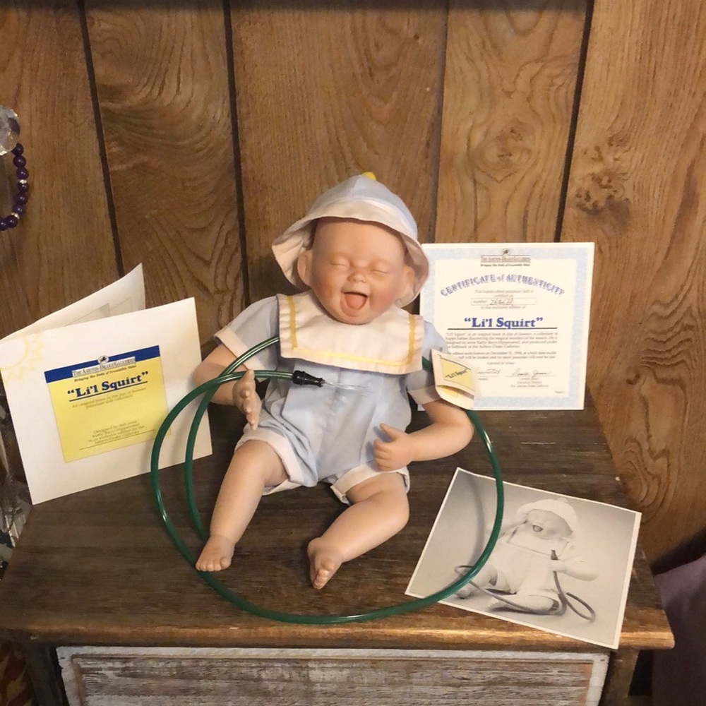 The Ashton Drake Galleries Collectible Li’l Squirt Porcelain Doll/Certificate